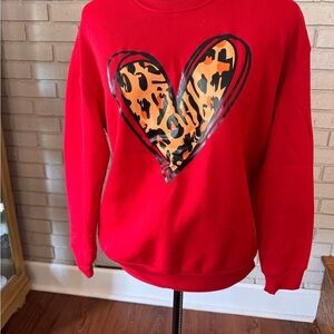 Red  leopard heart  Sweatshirt  size large.NWOT
